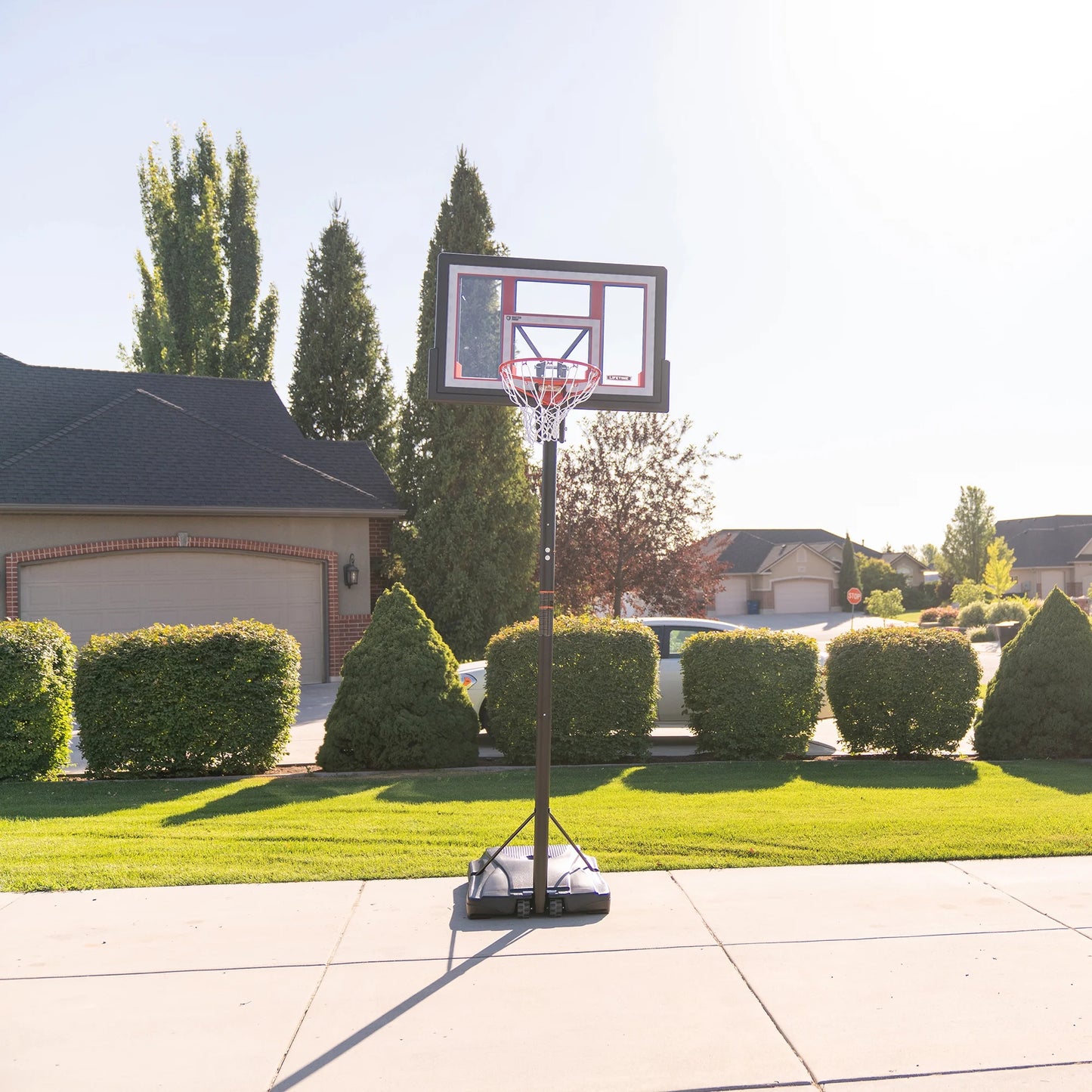 Lifetime 48-Inch Shatterproof Portable Basketball Hoop with Strong Arm Adjustment & Slam-It Rim - Model 90491-Outdoor Play