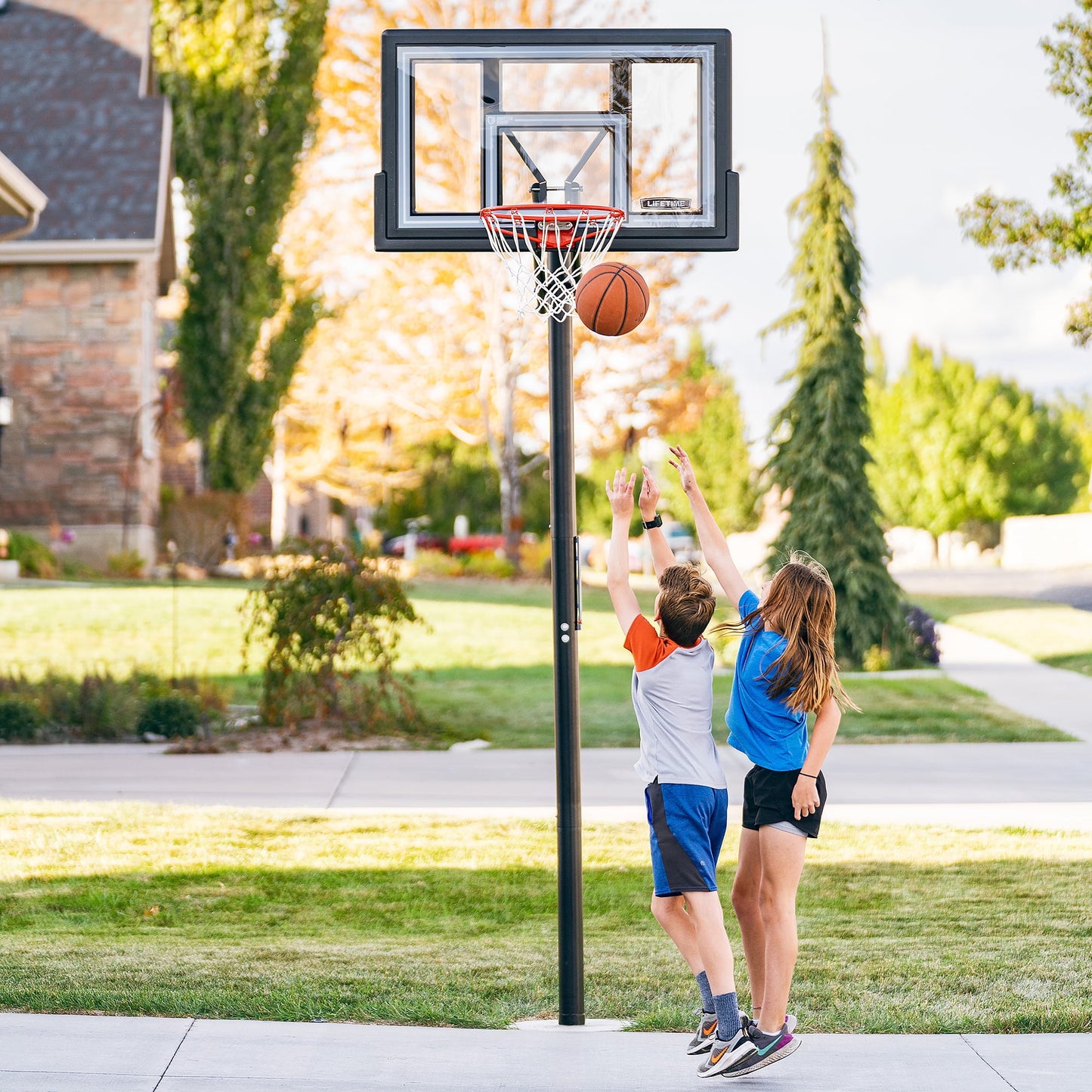 Lifetime 50-Inch Shatterproof Inground Basketball Hoop with Action Grip Adjustment & Slam-It Rim